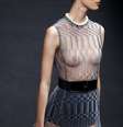 <p>Vestido transparente da Dior usado com hot pants</p>  Foto: AFP