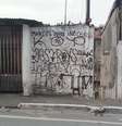 <p>Muros foram pichados alegando a inocência do adolescente</p>  Foto: Daniel Fernandes / Terra