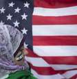 Garota síria Malek Al Rifai fica perto da bandeira dos Estados Unidos enquanto participa de um protesto em frente ao prédio das Nações Unidas, em Nova York. Chefes de defesa dos Estados Unidos, seus principais aliados do ocidente e da Turquia, Arábia Saudita e Catar se reunirão na Jordânia, nos próximos dias, para discutir a situação na Síria, disseram autoridades de defesa no sábado. 21/08/2013.  Foto: Adrees Latif / Reuters