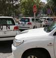 O comboio da ONU ao deixar hotel em Damasco  Foto: AP
