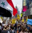 Declarações de Barack Obama levaram centenas de pesssoas a Times Square, em Nova York, para protestar contra a guerra  Foto: AP