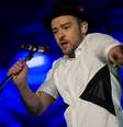 Coube ao astro Justin Timberlake fechar o Palco Mundo do terceiro dia de Rock in Rio, na madrugada desta segunda-feira (16); com repertório repleto de hits de seus dois discos solo anterior, cantor também apresentou canções de seu mais recente disco de estúdio, 'The 20/20 Experience', e um cover da banda australiana INXS  Foto: Mauro Pimentel / Terra