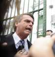 <p>Bolsonaro discute com Randolfe durante visita de parlamentares ligados à Comissão Nacional da Verdade ao antigo DOI-Codi</p>  Foto: Tânia Rego / Agência Brasil