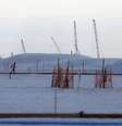 <p>Trabalhador caminha no local de construção do Porto de Açu em São João da Barra (RJ), uma das principais obras da OSX Brasil </p>  Foto: Ricardo Moraes / Reuters