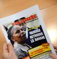 Revista Minute traz na capa a frase: "Maligna como um macaco, Taubira recupera a banana"  Foto: AFP