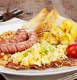 Refeição inglesa tem ovo, bacon, salsicha, feijão e pão  Foto: Getty Images 