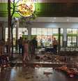 Estragos em frente a loja saqueada em San Miguel de Tucuman  Foto: AP