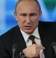 Putin fala durante entrevista coletiva anual, em Moscou  Foto: AP