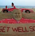 Schumacher ganhou homenagem de artista indiano Sudarsan Pattnaik, que retratou alemão na areia  Foto: AFP