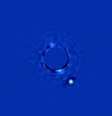Beta Pictoris b, um planeta muito maior que Júpiter, é registrado pelo instrumento GPI ao lado de sua estrela, que tem o brilho escondido e aparece no centro da imagem. O GPI foi criado para registrar exoplanetas  Foto: Christian Marois, NRC Canada / Divulgação
