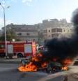 Carro incendiado em dia de votação em Giza, no Egito  Foto: AFP