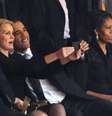 Michelle durante a famigerada fotografia entre o premiê britânico, David Cameron; a premiê dinamarquesa, Helle Thorning-Schmidt, e seu marido, Barack Obama  Foto: AFP