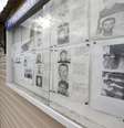 Em Adler, distrito de Sochi, mural de policiais exibe fotos de procurados por suspeita de terrorismo  Foto: Reuters