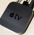 <p>Modelo atual da Apple TV, aparelho que transmite conteúdo para TVs a partir de outros produtos da marca</p>  Foto: Getty Images 