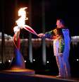 Irina Rodnina e Vladislav Tretyak acendem a pira olímpica em Sochi  Foto: Getty Images 