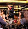 Moderno Churrascaria - O típico churrasco brasileiro pode ser encontrado na Moderno, primeiro restaurante do tipo em um navio de cruzeiros. Localizada em diversos navios da frota da companhia, a churrascaria funciona em estilo rodízio e são oferecidos diversos cortes de carne de gado, suínos e frango  Foto: Norwegian Cruise Line/Divulgação