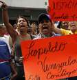 Apoiadores do líder oposicionista Leopoldo López protestam, em Caracas  Foto: Reuters