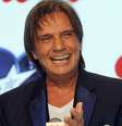 <p>Roberto Carlos é o novo como garoto propaganda da marca Friboi</p>  Foto: Alan Morici / Terra