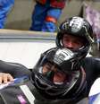 Dallas Robinson e Nick Cunningham fazem graça na competição do bobsled  Foto: Reuters