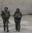 <p>Soldados das Forças Armadas da Ucrânia patrulham cidade fronteiriça em meio a tensão com a Rússia</p>  Foto: AP