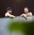<p>David Beckham na sacada do hotel que está hospedado</p>  Foto: André freitas e Gabriel Reis / AgNews