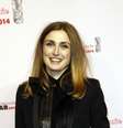 Atriz francesa Julie Gayet ao chegar para a 39ª cerimômia de premiação do cinema francês Cesar Awards, em Paris, em 28 de fevreiro  Foto: AFP