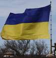<p>Soldado ucraniano perto de uma bandeira na base A2904 na cidade de Bakhchisaray, na Crimeia (imagem de arquivo)</p>  Foto: Thomas Peter / Reuters