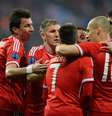 Bayern de Munique comemora gol contra Arsenal e classificação para as quartas da Liga dos Campeões  Foto: AFP