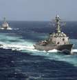 <p><span style="color: rgb(80, 80, 80); font-size: 12px; line-height: 18px;">Os navios americanos USS Kidd e USS Pinckney fazem parte das buscas pelo avião malaio desaparecido </span></p>  Foto: Reuters