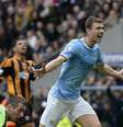 <p>Dzeko marcou o segundo gol da&nbsp;vit&oacute;ria do Manchester City</p>  Foto: Reuters