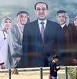 <p>Um homem iraquiano passa por um outdoor de campanha eleitoral, com o primeiro-ministro iraquiano, Nuri al-Maliki, ao centro, nesta ter&ccedil;a-feira,&nbsp;25 de mar&ccedil;o, em Bagd&aacute;, antes das elei&ccedil;&otilde;es parlamentares de abril</p>  Foto: AFP