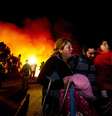 <p>Segundo os balanços oficiais, são 2.500 as casas destruídas pelo incêndio que começou no último sábado</p>  Foto: AFP