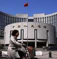 <p>Sede do Banco Popular da China, banco central chinês, em Pequim: Premiê Li Keqiang está confiante de que o país atingirá sua meta de crescimente de 7,5% em 2014</p>  Foto: Petar Kujundzic / Reuters