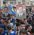 <p>L&iacute;deres t&ecirc;m buscado solu&ccedil;&atilde;o para a guerra civil no pa&iacute;s, que j&aacute; dura tr&ecirc;s anos.&nbsp;Na foto, de&nbsp;11 de fevereiro, partid&aacute;rios do presidente s&iacute;rio, Bashar al-Assad, participam de marcha em apoio ao governo, na cidade de Homs, S&iacute;ria</p>  Foto: AP