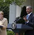 <p>Obama e Merkel participam de coletiva de imprensa conjunta no Jardim das Rosas da Casa Branca, em Washington, neste 2 de maio</p>  Foto: AP