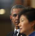 <p>Presidente da Coreia do Sul, Park Geun-hye, é vista sob o olhar de Barack Obama; ela também foi insultada pela mídia norte-coreana </p>  Foto: Reuters
