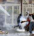 <p>Manifestantes anti-governo participam de protesto em Caracas, em 8 de maio de 2014</p>  Foto: Carlos Garcia Rawlins / Reuters