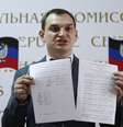 <p>"Foi surpreendentemente fácil fazer a contagem de votos", disse o chefe da comissão eleitoral de grupos pró-Rússia, Roman Lianguin</p>  Foto: Reuters