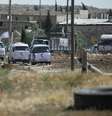 Veículos estacionados em frente à prisão de Allepo; quase 850 já foram mortos pelo regime somente em 2014  Foto: Reuters