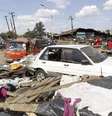 <p>Vista geral da destruição causada por duas explosões que mataram ao menos 10 pessoas em um mercado em Nairóbi, capital do Quênia</p>  Foto: Thomas Mukoya / Reuters