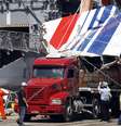 <p>Ao todo, 154 corpos foram recuperados durante buscas no oceano</p>  Foto: AFP