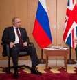<p>Primeiro-ministro britânico David Cameron se encontrou com o presidente russo, Vladimir Putin, em um aeroporto de Paris, na França</p>  Foto: Reuters