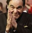 <p>Diretor de cinema Oliver Stone chega ao 16º Festival Internacional de Cinema de Xangai, em 15 de junho de 2013</p>  Foto: Reuters