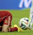 <p>Campeã em 2010, Espanha foi eliminada logo na segunda rodada da fase de grupos</p>  Foto: AP