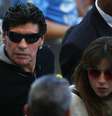 <p>Maradona e a filha Gianina, ex-mulher de Agüero</p>  Foto: Getty Images 