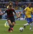 <p>Nascido na Polônia, atacante alemão chegou ao 16º gol em Mundiais</p>  Foto: Marcos Brindicci / AFP