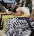 <p>Parentes choram sobre o caixão de um palestino, coberto por uma bandeira amarela do Fatah, durante seu funeral na cidade de Gaza, em 10 de julho</p><p> </p>  Foto: Adel Hana / Reuters