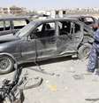 <p>Um policial inspeciona os danos causados a alguns veículos após um ataque com um carro-bomba perto de uma delegacia de polícia, ao sul da cidade de Kirkuk, em 10 de julho</p><p> </p>  Foto: Ako Rasheed  / Reuters