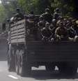 <p>Combatentes&nbsp;pr&oacute;-russos do chamado batalh&atilde;o Vostok&nbsp;viajam em caminh&otilde;es na cidade ucraniana de Donetsk, em 10 de julho</p>  Foto: Maxim Zmeyev / Reuters