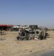 <p>Ve&iacute;culos queimados pertencentes &agrave;s for&ccedil;as de seguran&ccedil;a iraquianas s&atilde;o vistos em uma estrada que leva a Samarra, na prov&iacute;ncia de Salahuddin, em 12 de julho</p>  Foto: Thaier Al-Sudani / Reuters